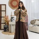  العباءة التقليدية والجاكيت العصري بنقوشه الفنية